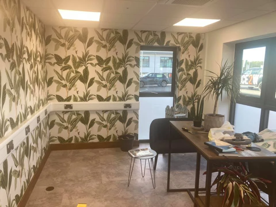 Commercial interior fit-out with a decorated feature wall in Swansea