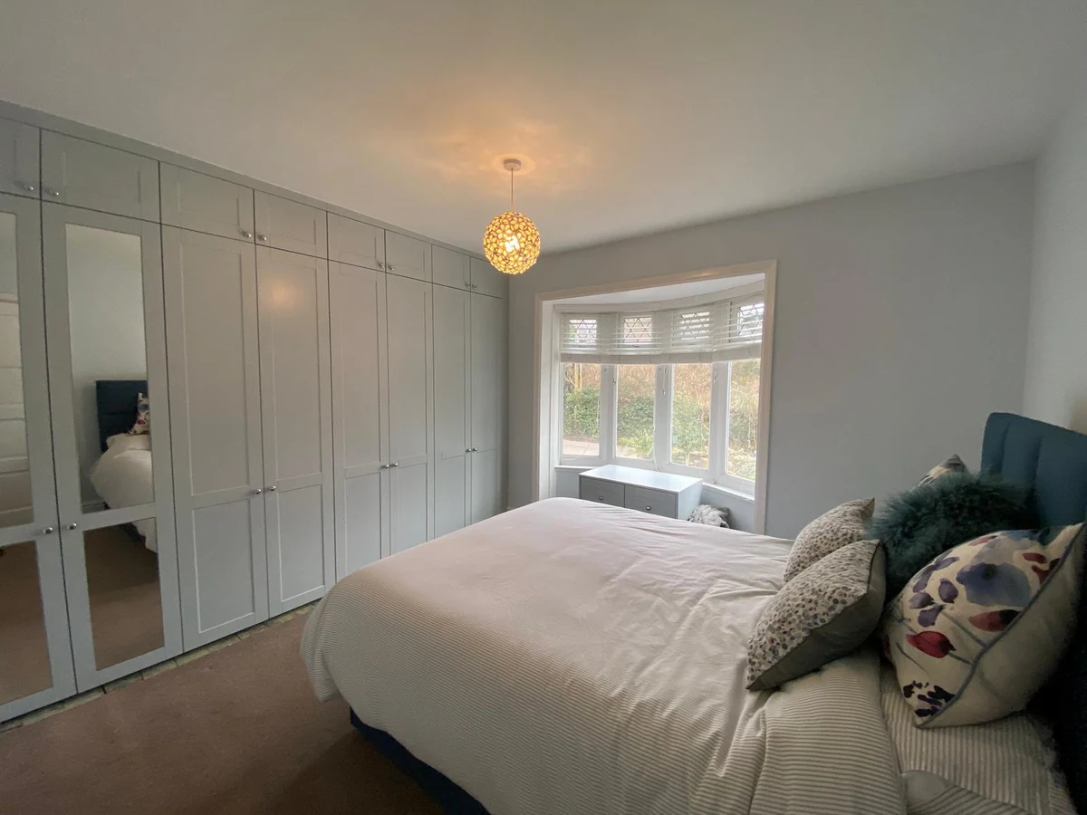 435-fitted-bedroom-wardrobes-with-exposed-unfinished-carpet-edges-swansea-daffodil-property-refurbishment Fitted bedroom wardrobes installed in a Swansea house